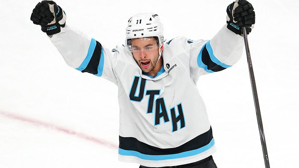 Utah Mammoth right wing Dylan Guenther (11) celebrates a goal scored by Utah Mammoth center Logan Cooley (92) (not pictured) against the Vegas Golden Knights during the third period of game two of the first round of the 2026 Stanley Cup Playoffs at T-Mobile Arena.