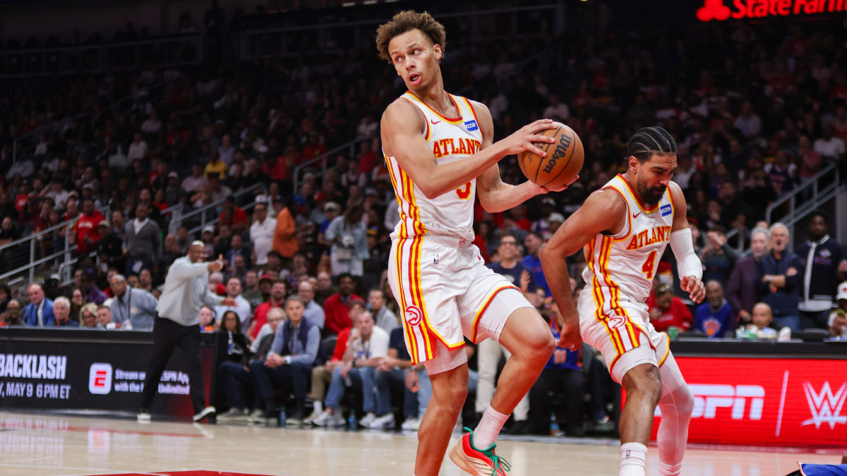 Atlanta Hawks guard Dyson Daniels (5) grabs a loose ball against the New York Knicks in the second quarter during game six of the first round of the 2026 NBA Playoffs at State Farm Arena. 