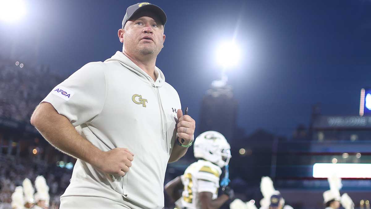 https://wp.clutchpoints.com/wp-content/uploads/2026/09/Georgia-Tech-football-HC-Brent-Key-runs-onto-the-field-for-season-opener-vs.-Colorado.jpg