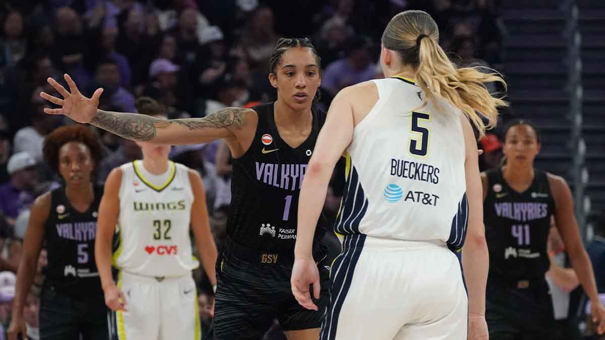 Aug 17, 2026; San Francisco, California, USA; Golden State Valkyries forward Gabby Williams (1) guards Dallas Wings guard Paige Bueckers (5) in the second quarter at Chase Center. Mandatory Credit: David Gonzales-Imagn Images