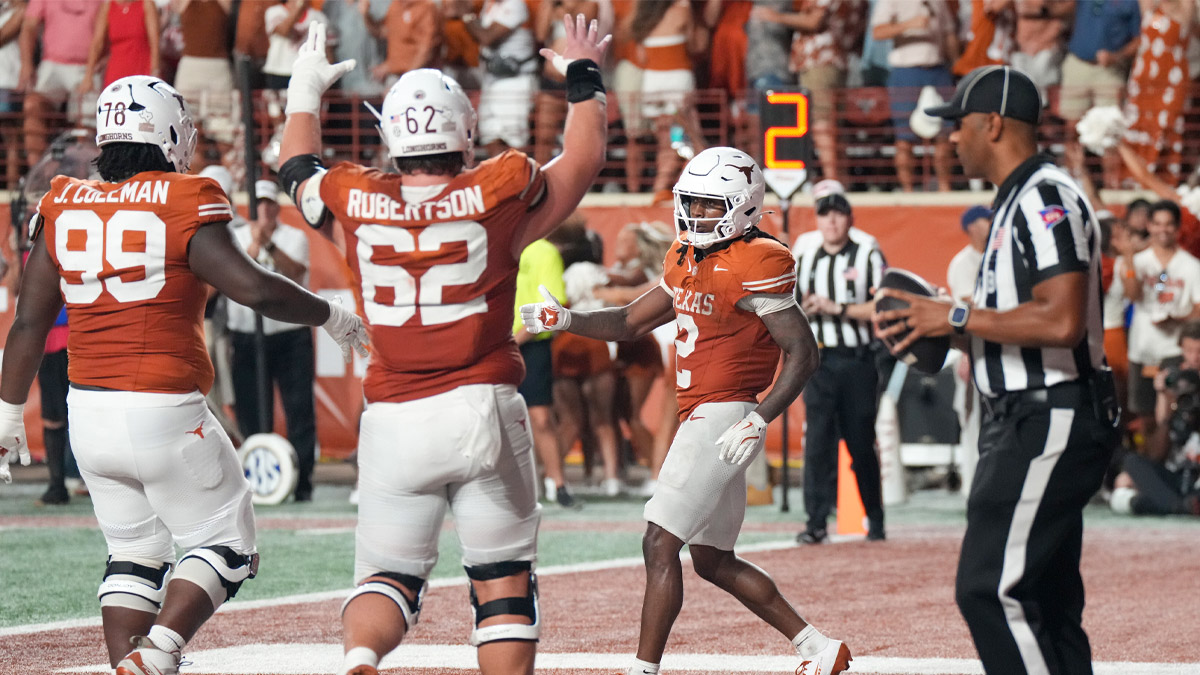 Texas Longhorns running back Hollywood Smothers (2) celebrates after scoring a touchdown against the Ohio State Buckeyes during the second half at Darrell K Royal-Texas Memorial Stadium. 