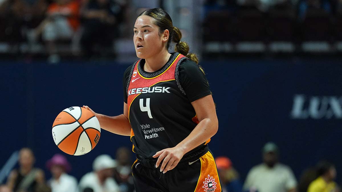 Connecticut Sun guard Charlisse Leger-Walker (4) returns the ball against the Golden State Valkyries in the second half at Mohegan Sun Arena.
