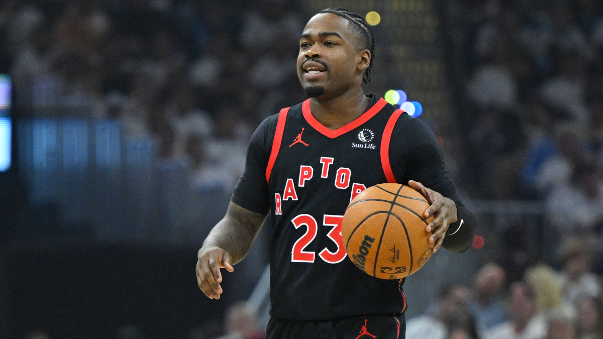Toronto Raptors guard Jamal Shead (23) brings the ball up court against the Cleveland Cavaliers in the first quarter of game five of the first round of the 2026 NBA Playoffs at Rocket Arena. 