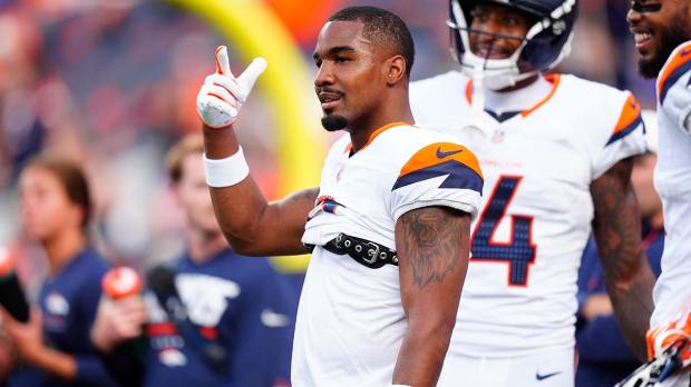 Denver Broncos wide receiver Jaylen Waddle (17) reacts before the preseason game against the Green Bay Packers at Empower Field at Mile High.
