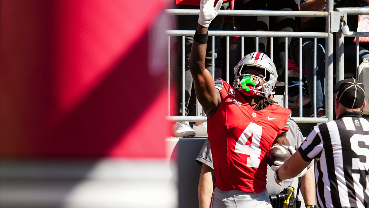 Ohio State Buckeyes wide receiver Jeremiah Smith (4) celebrates a touchdown during the NCAA football game against the Illinois Fighting Illini at Ohio Stadium in Columbus on Sept. 26, 2026.