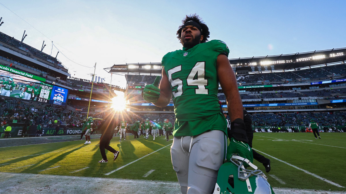 Philadelphia Eagles linebacker Jeremiah Trotter Jr. (54) walks on the field before the game against the Washington Commanders at Lincoln Financial Field.
