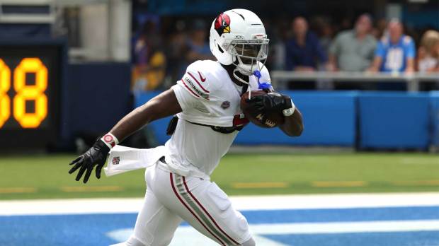 Arizona Cardinals running back Jeremiyah Love (4) warms up prior to a game against the Los Angeles Chargers at SoFi Stadium.