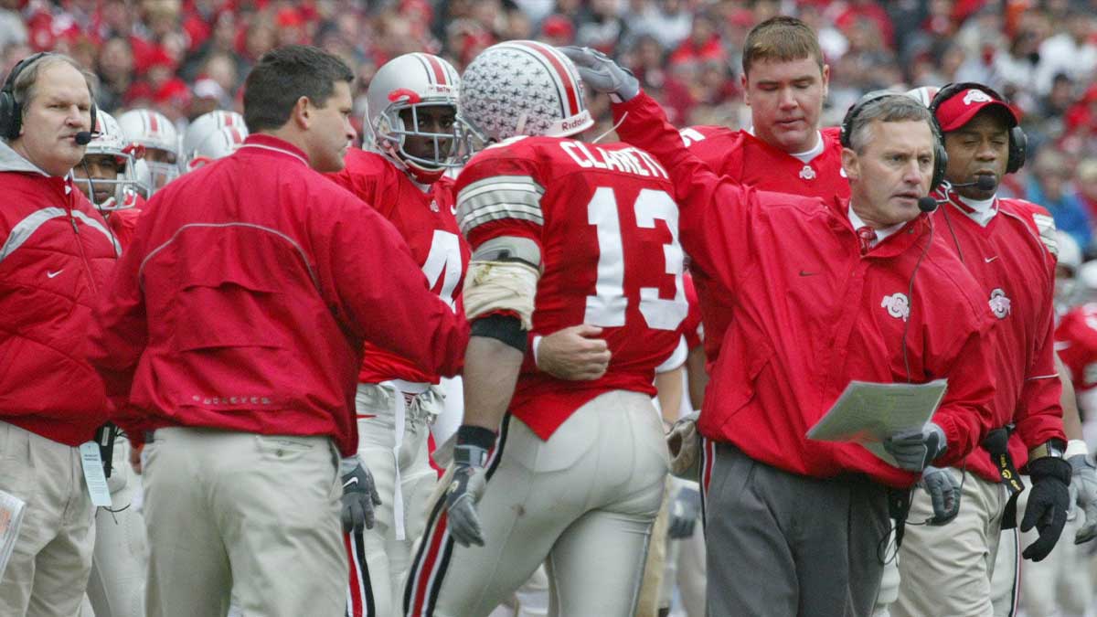 Former Ohio State coach Jim Tressel reacts to Maurice Clarett’s Victory Bell assignment for Ring of Honor game