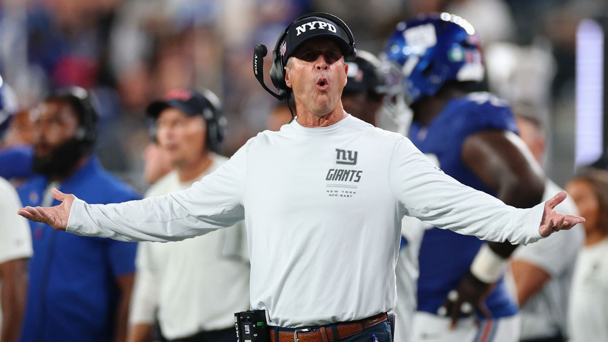 New York Giants head coach John Harbaugh reacts after a play against the Dallas Cowboys during the second quarter at MetLife Stadium