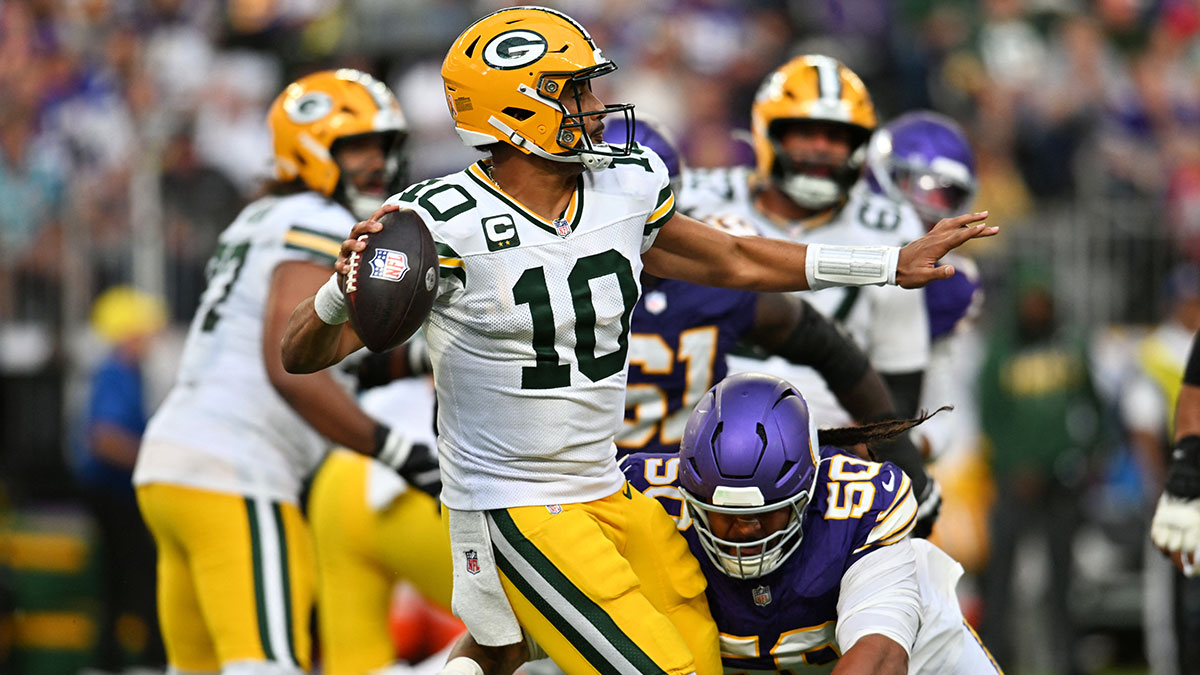 Sep 13, 2026; Minneapolis, Minnesota, USA; Minnesota Vikings defensive line Levi Drake Rodriguez (50) tackles Green Bay Packers quarterback Jordan Love (10) as he makes a pass during the second half at U.S. Bank Stadium.