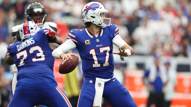 Buffalo Bills quarterback Josh Allen (17) passes the ball during the game against the Houston Texans at Reliant Stadium.
