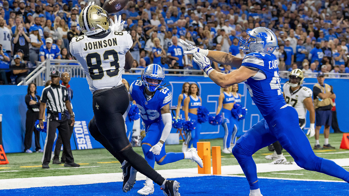 Sep 13, 2026; Detroit, Michigan, USA; New Orleans Saints tight end Juwan Johnson (83) makes a touchdown catch against the Detroit Lions during the fourth quarter at Ford Field.