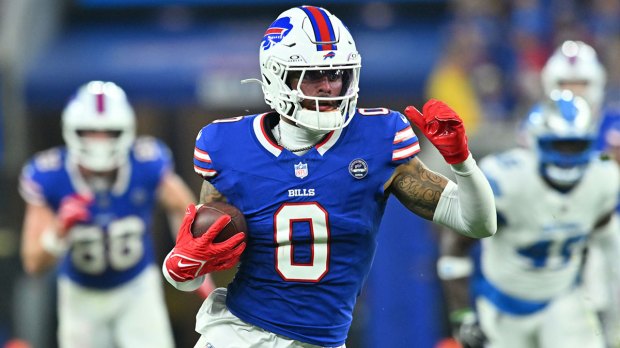 Buffalo Bills wide receiver Keon Coleman (0) runs against the Detroit Lions during the first half at New Highmark Stadium