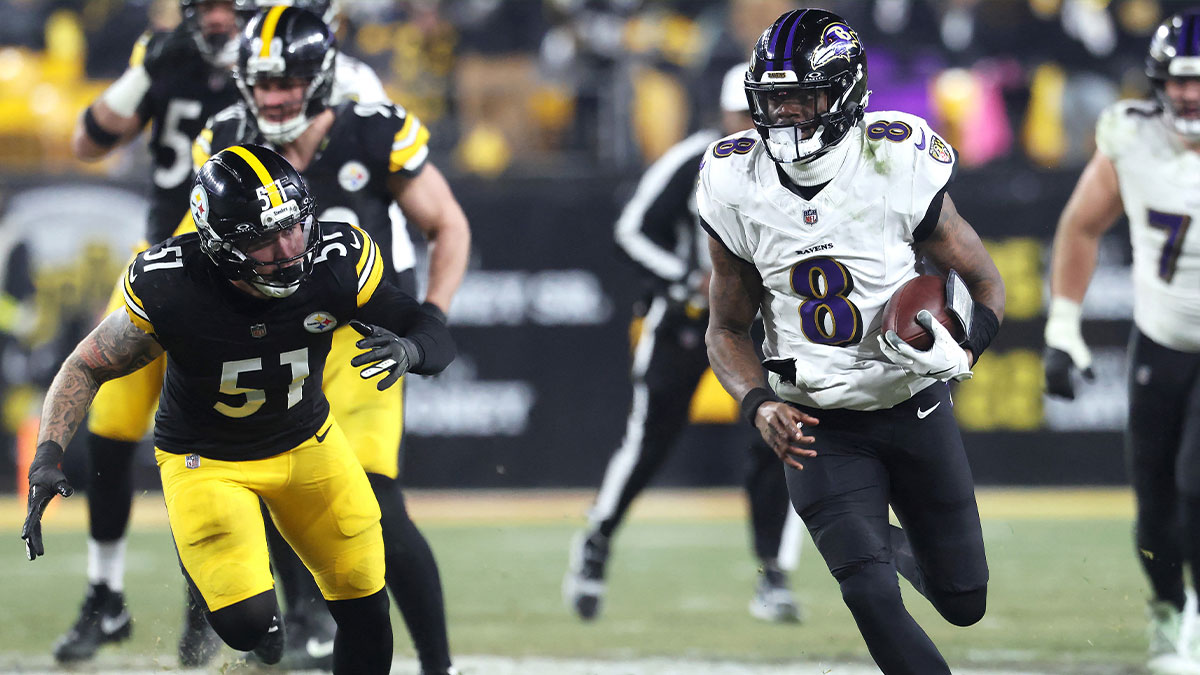 Baltimore Ravens quarterback Lamar Jackson (8) rushes the ball past Pittsburgh Steelers linebacker Nick Herbig (51) during the first half at Acrisure Stadium. 