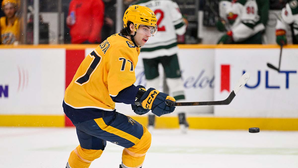 Nashville Predators right wing Luke Evangelista (77) knocks the puck down against the Minnesota Wild during the third period at Bridgestone Arena.