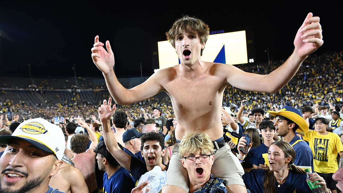 Watch Michigan football fans storm the field after unforgettable Hail Mary win