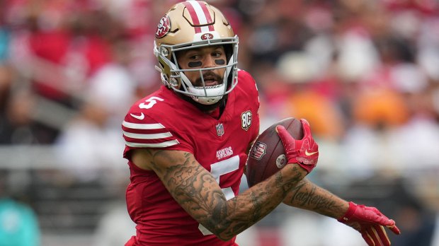 San Francisco 49ers wide receiver Mike Evans (5) runs the ball against the Miami Dolphins in the third quarter at Levi's Stadium