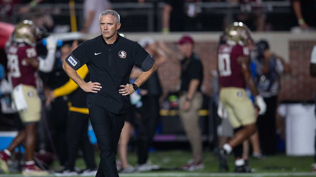 Florida State football coach Mike Norvell stands on the field during warmups before his team faced SMU at Doak Campbell Stadium on Monday, Sept. 7, 2026.