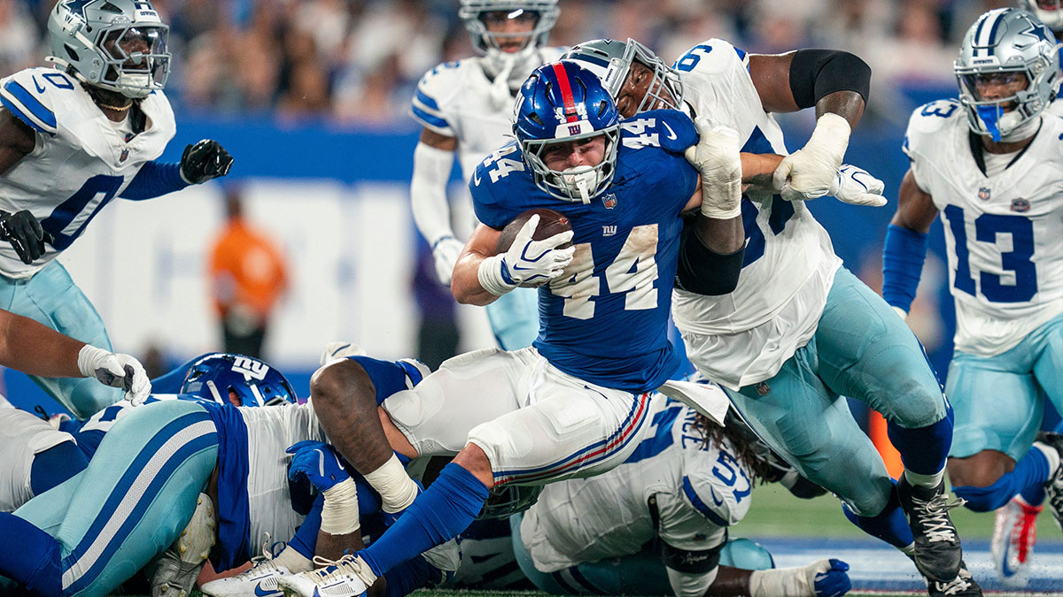 New York Giants running back Cam Skattebo (44) runs with the ball before being tackled during a week one opening game between the New York Giants and Dallas Cowboys at Metlife Stadium on Sunday, Sept. 13, 2026, in East Rutherford, NJ.