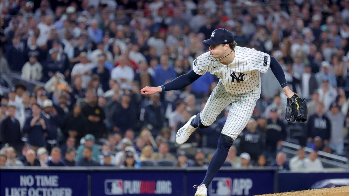 New York Yankees starting pitcher Cam Schlittler (31) follows through on a pitch against the Boston Red Sox during the sixth inning of game one of the Wildcard round of the 2026 MLB Playoffs at Yankee Stadium. Mandatory Credit: Brad Penner-Imagn Images