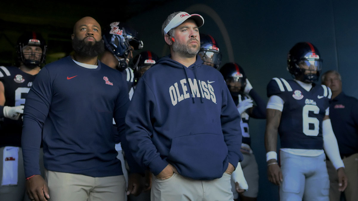 https://wp.clutchpoints.com/wp-content/uploads/2026/09/Ole-Miss-football-HC-Pete-Golding-gets-ready-to-lead-his-team-out-for-Louisville-clash.jpg