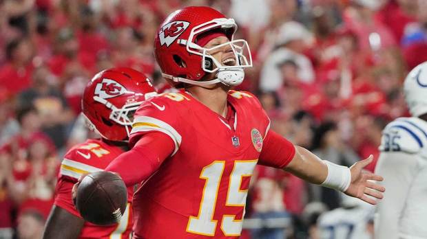 Kansas City Colts quarterback Patrick Mahomes (15) celebrates after a touchdown against the Kansas City Chiefs during the third quarter at GEHA Field at Arrowhead Stadium.