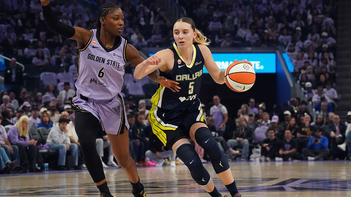 Sep 27, 2026; San Francisco, California, USA; Dallas Wings guard Paige Bueckers (5) dribbles against Golden State Valkyries guard-forward Kaila Charles (6) in the second quarter during game one of the first round for the 2026 WNBA Playoffs at Chase Center. Mandatory Credit: David Gonzales-Imagn Images