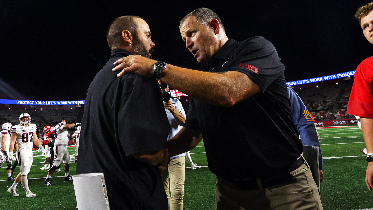 https://wp.clutchpoints.com/wp-content/uploads/2026/09/Rutgers-HC-Greg-Schiano-shakes-hands-with-UMass-HC-Joe-Harasymiak-after-blowout-loss.jpg