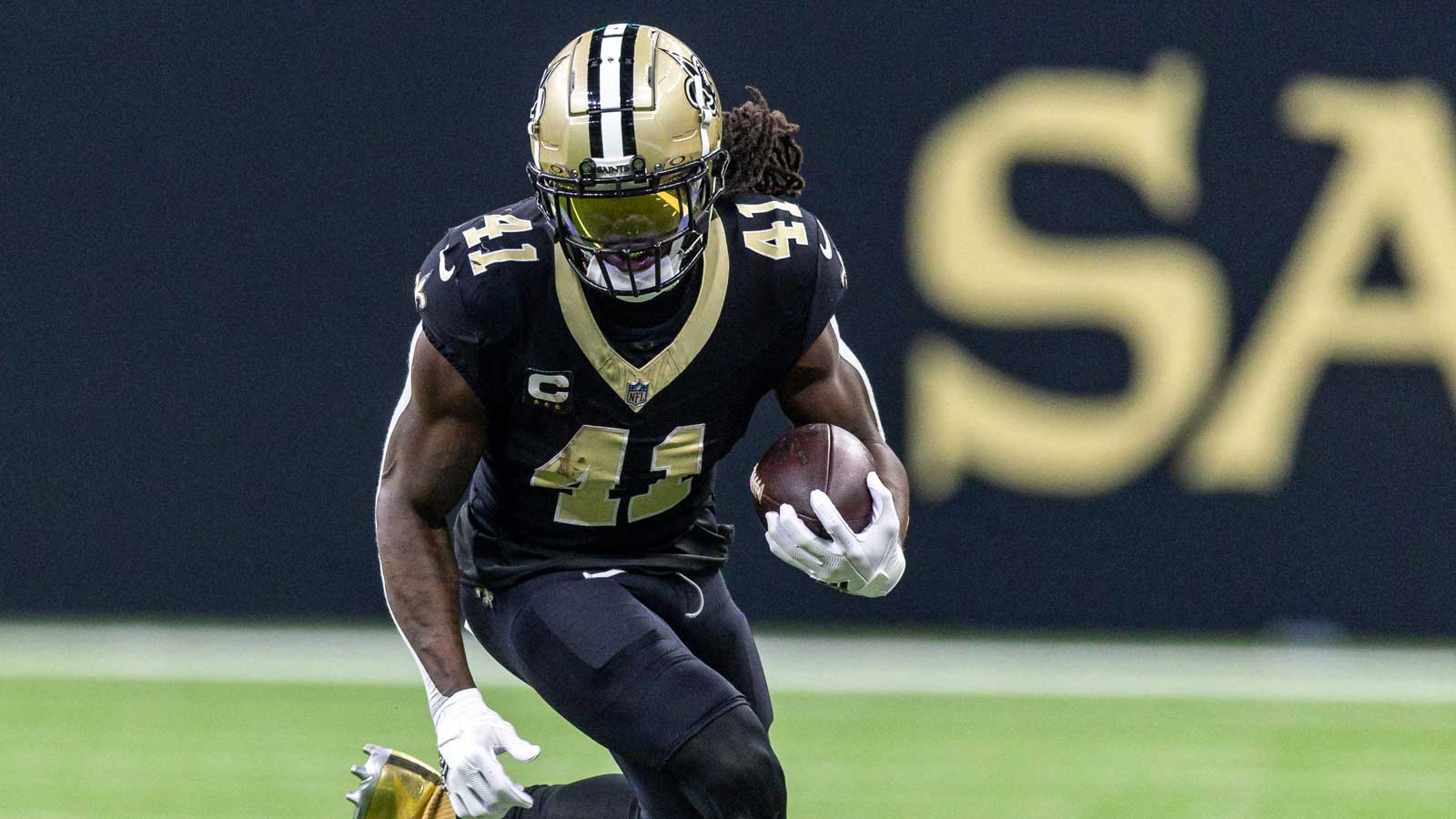 New Orleans Saints running back Alvin Kamara (41) runs against the San Francisco 49ers during the first half at Caesars Superdome.