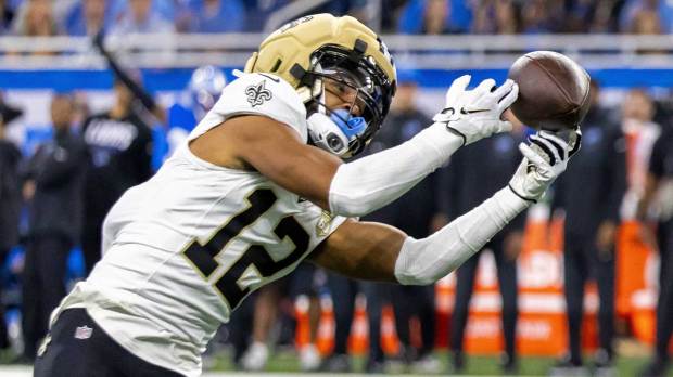 Saints wide receiver Chris Olave (12) makes catch