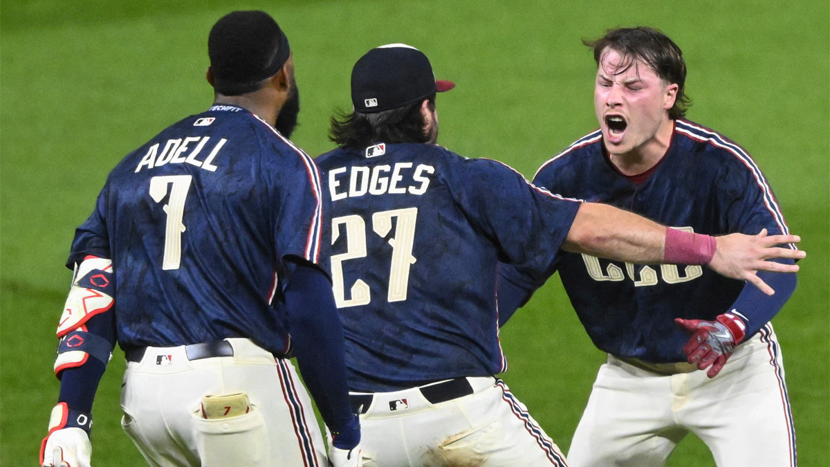 https://wp.clutchpoints.com/wp-content/uploads/2026/09/Travis-Bazzana-celebrates-with-teammates-after-walk-off-hit.jpg