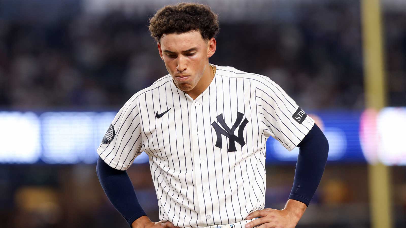 https://wp.clutchpoints.com/wp-content/uploads/2026/09/Yankees-SS-George-Lombard-Jr.-hangs-his-head.jpg