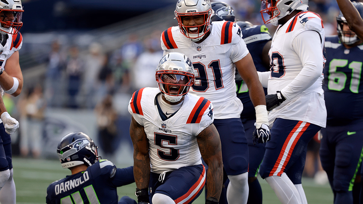 New England Patriots defensive end Dre'Mont Jones (5) reacts after sacking Seattle Seahawks quarterback Sam Darnold (14) during the first quarter at Lumen Field.