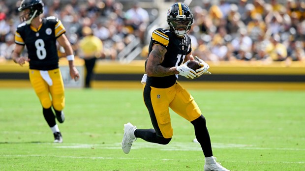 Pittsburgh Steelers wide receiver Michael Pittman Jr. (11) runs after a catch during the first quarter against the Atlanta Falcons at Acrisure Stadium.