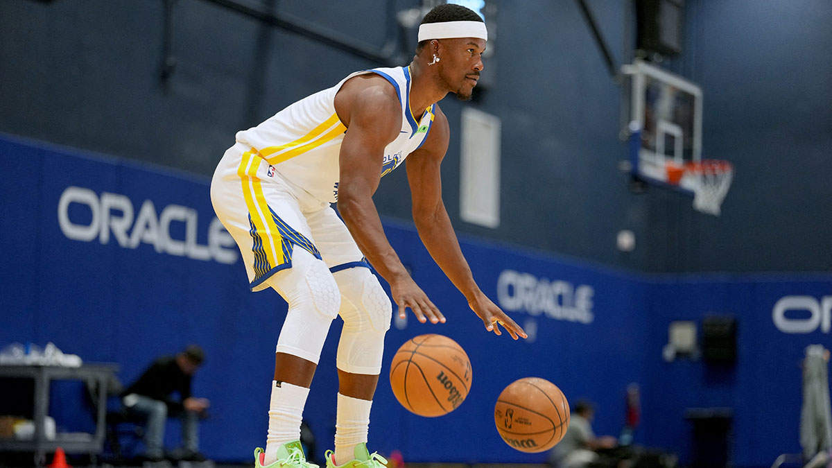 Sep 28, 2026; San Francisco, CA, USA; Golden State Warriors forward Jimmy Butler III (10) dribbles two basketballs during Media Day at the Chase Center. Mandatory Credit: Cary Edmondson-Imagn Images