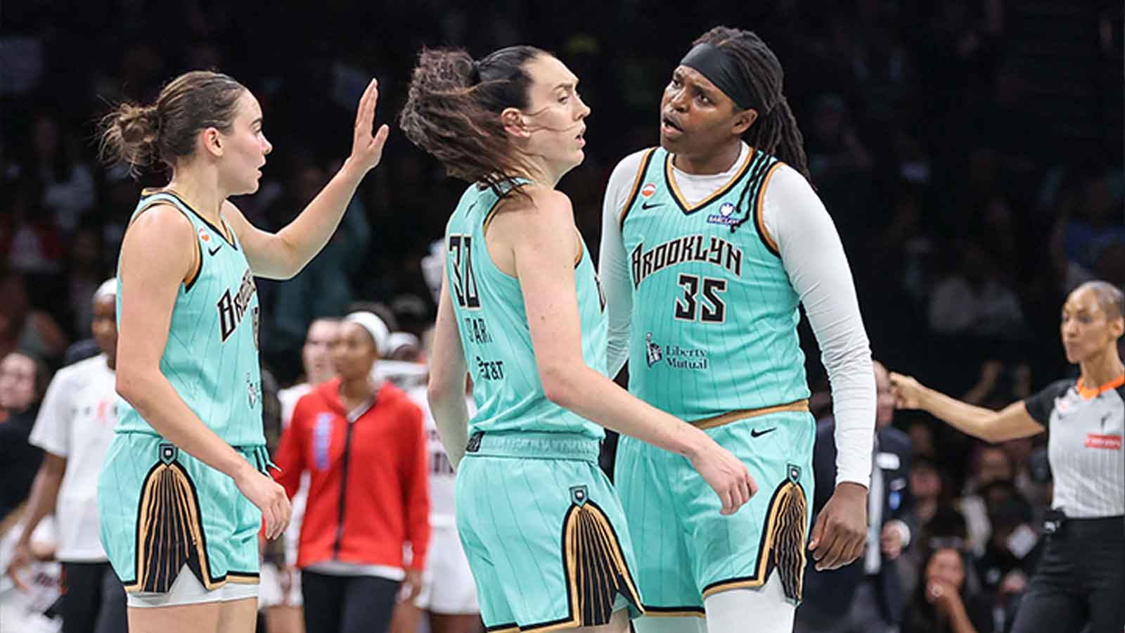 Sep 21, 2026; Brooklyn, New York, USA; New York Liberty center Jonquel Jones (35) celebrates with forward Breanna Stewart (30) after the Atlanta Dream call a time out in the third quarter at Barclays Center. Mandatory Credit: Wendell Cruz-Imagn Images