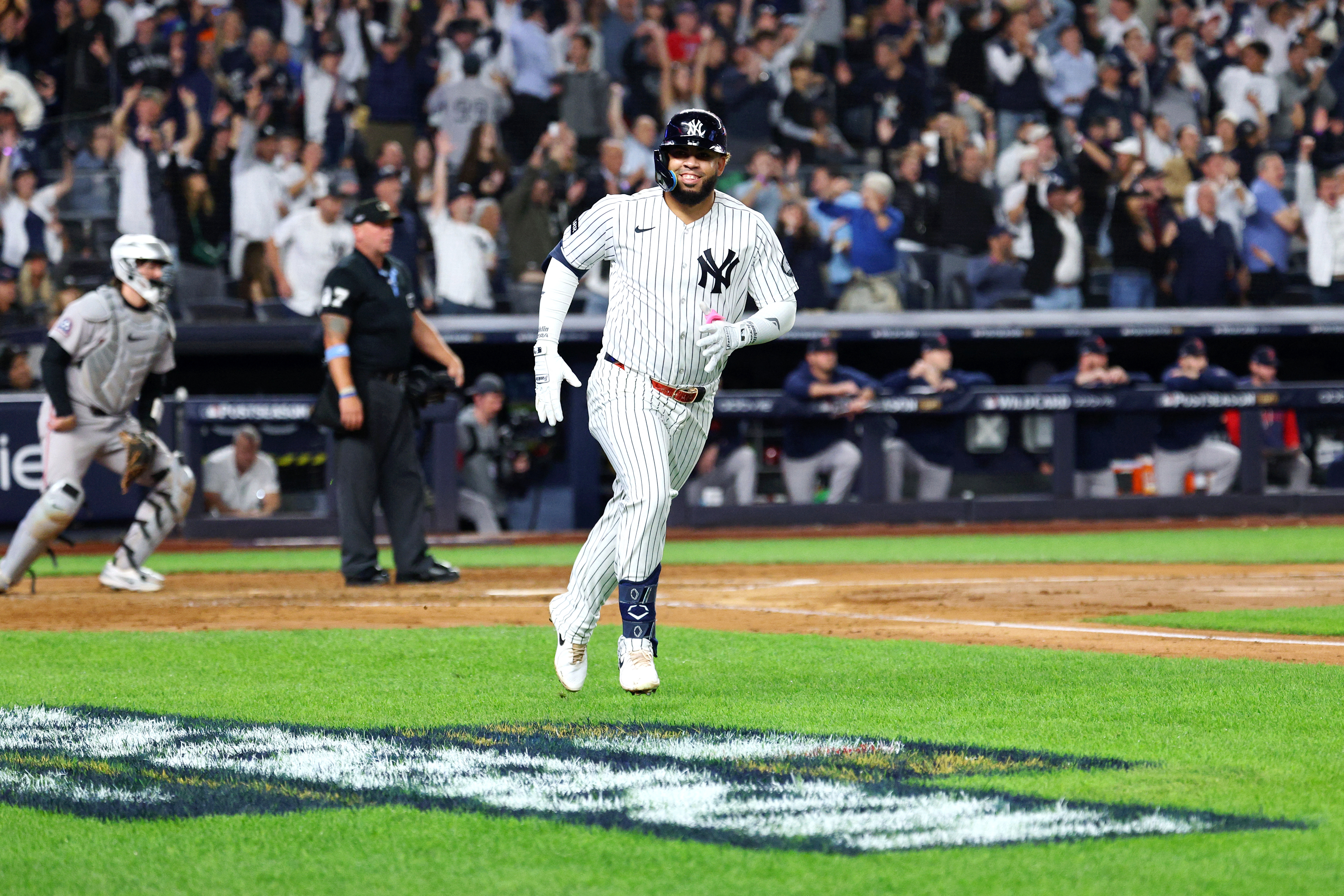 New York Yankees first baseman Luis Garcia Jr. (26) reacts after hitting a solo home run in the fourth inning against the Boston Red Sox during game two of the Wildcard round for the 2026 MLB Playoffs at Yankee Stadium. Mandatory Credit: Vincent Carchietta-Imagn Images