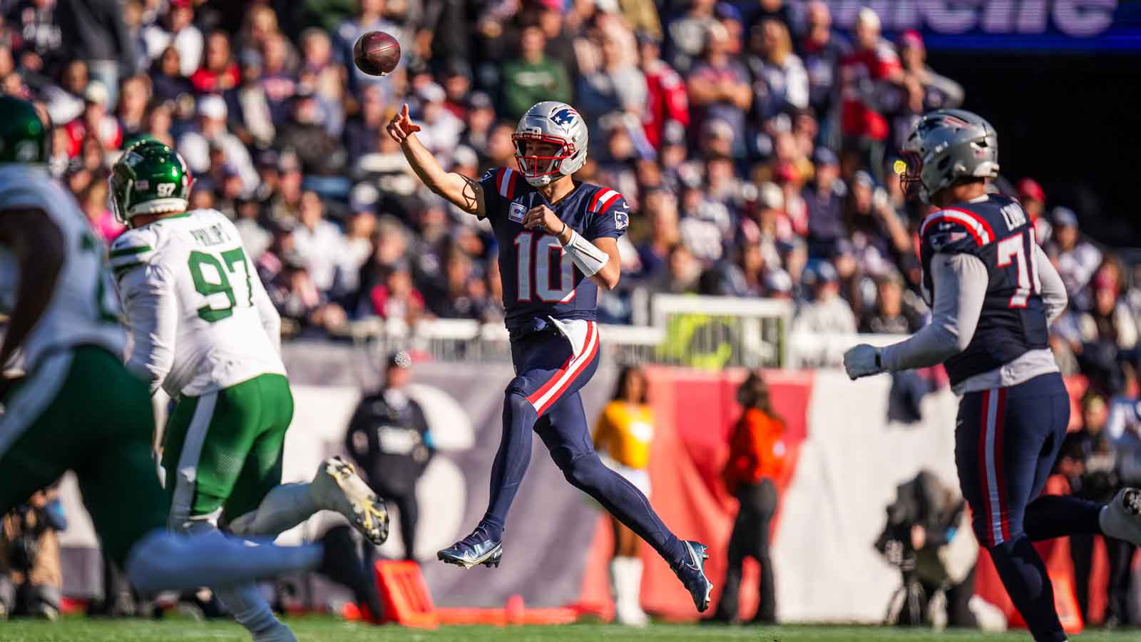 New England Patriots quarterback Drake Maye (10) throws a pass against the New York Jets in the second half at Gillette Stadium.