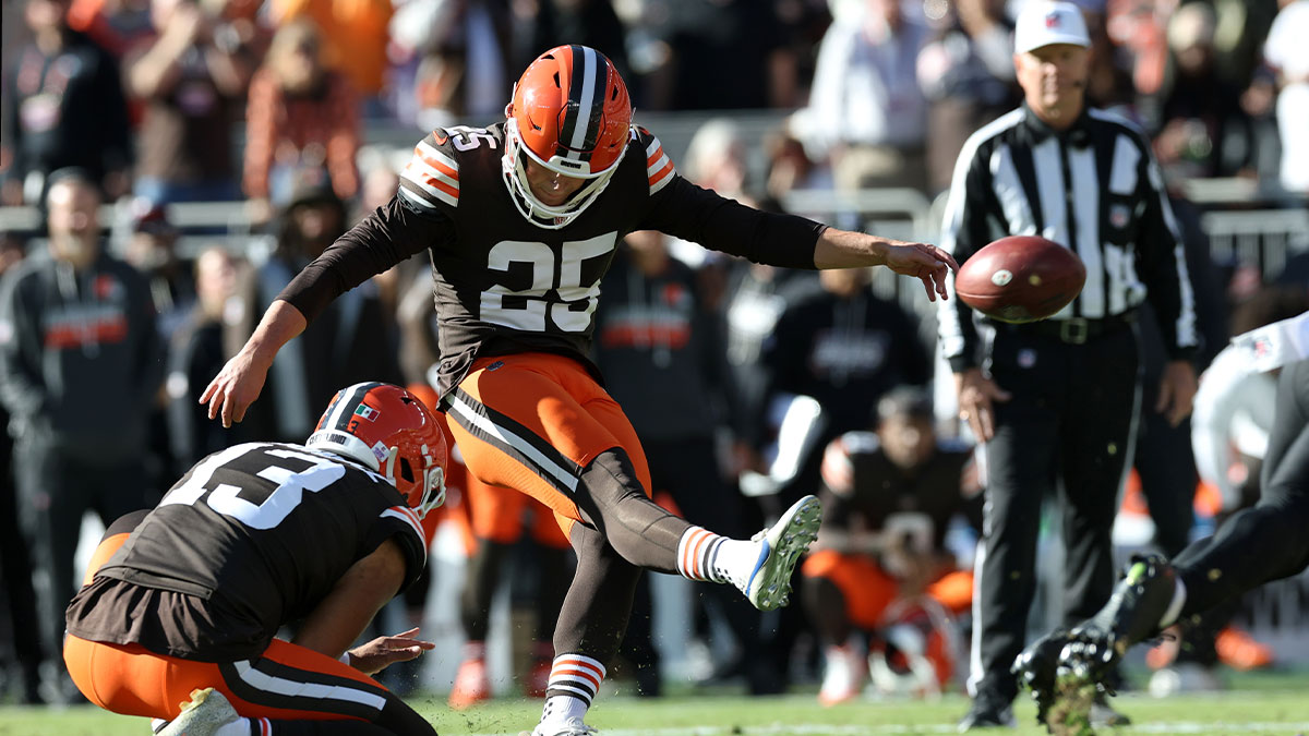 Oct 18, 2026; Cleveland, Ohio, USA; Cleveland Browns kicker Andre Szmyt (25) kicks the game winning field goal on a hold from punter Corey Bojorquez (13) in the fourth quarter against the Baltimore Ravens at Huntington Bank Field.