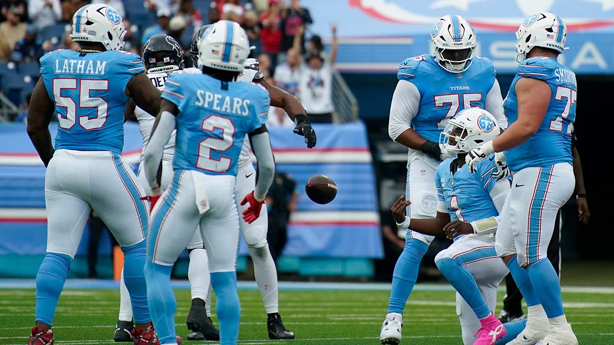 Tennessee Titans quarterback Cam Ward (1) is sacked on fourth down during the fourth quarter against the Houston Texans at Nissan Stadium in Nashville, Tenn., Sunday, Oct. 11, 2026.