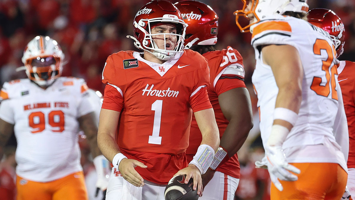 Houston Cougars quarterback Conner Weigman (1) reacts after running for a first down during the fourth quarter against the Oklahoma State Cowboys at TDECU Stadium.
