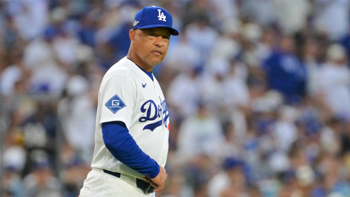 Los Angeles Dodgers manager Dave Roberts walks to the mound during the fourth inning against the Atlanta Braves in game two of the NLDS for the 2026 MLB Playoffs at Uniqlo Field at Dodger Stadium.