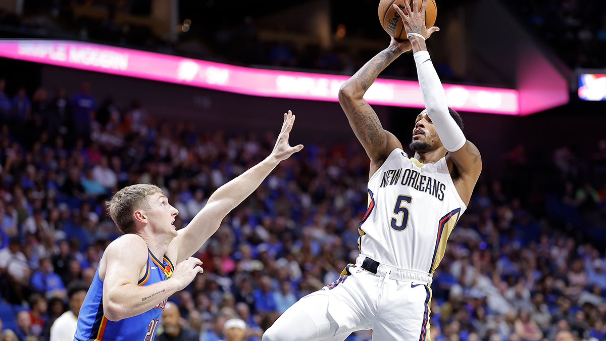 New Orleans Pelicans guard Dejounte Murray (5) shoots over Oklahoma City Thunder guard Josh Dix (21) during the first half at BOK Center.