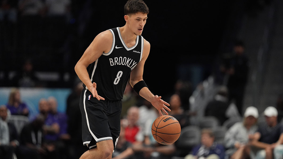 Brooklyn Nets guard Egor Demin (8) brings the ball up court against the Charlotte Hornets during the first quarter at Spectrum Center.