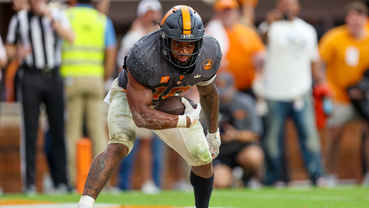 Tennessee Volunteers running back DeSean Bishop (18) scores a touchdown against the Auburn Tigers during the second half at Neyland Stadium.