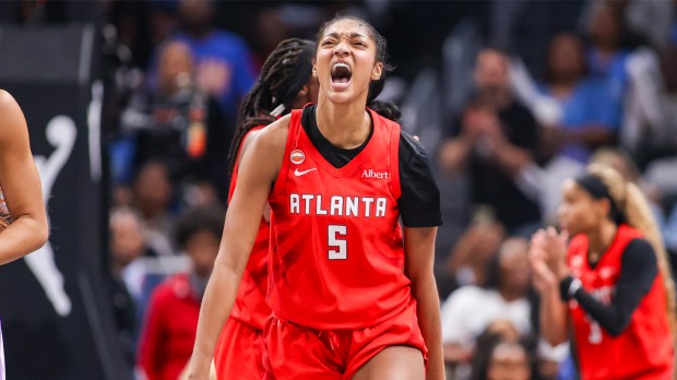Atlanta Dream forward Angel Reese (5) reacts after a play against the Golden State Valkyries in the second quarter during game six of the 2026 WNBA Finals at State Farm Arena.