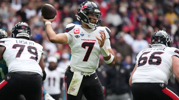 Houston Texans quarterback C.J. Stroud (7) throws the ball during the first half against the Jacksonville Jaguars at Wembley Stadium.