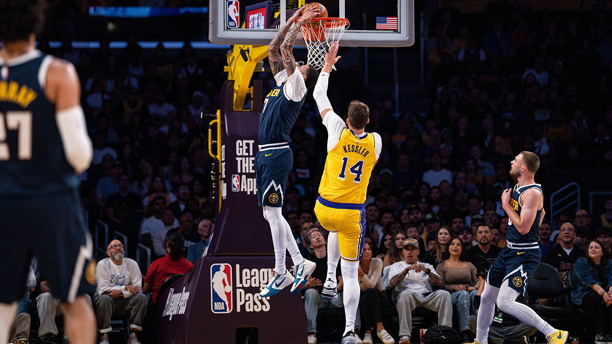 Denver Nuggets forward Trevon Brazile (7) dunks in the first quarter against Los Angeles Lakers center Walker Kessler (14) at Crypto.com Arena.