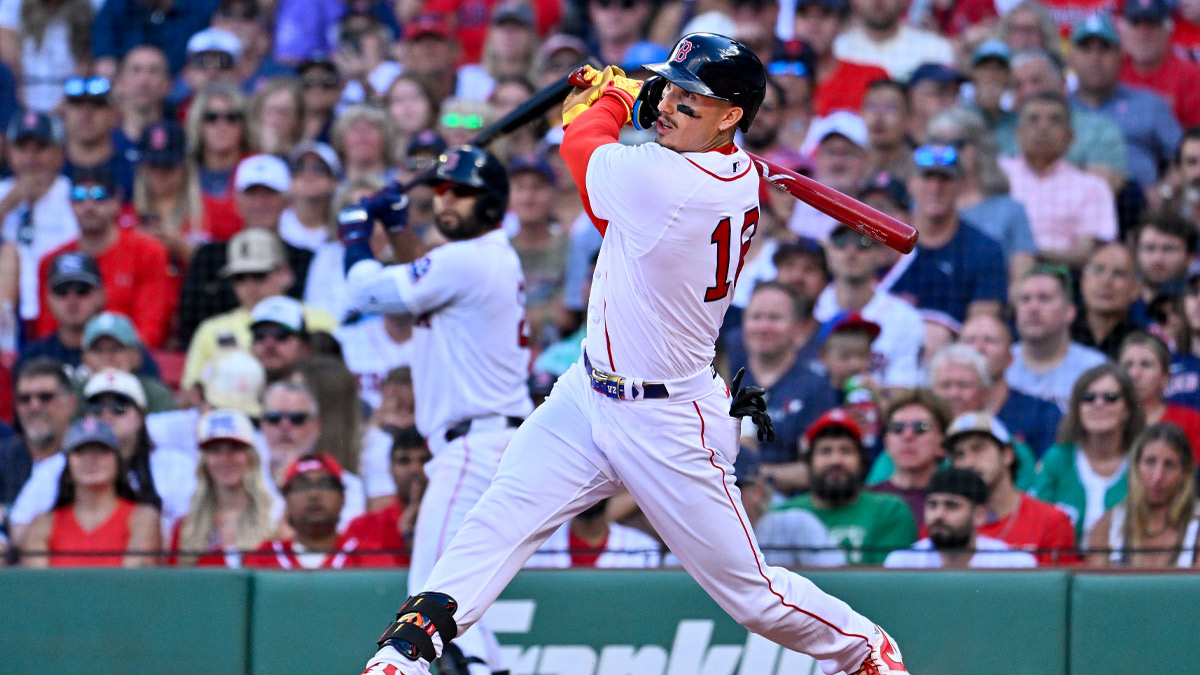Boston Red Sox left fielder Jarren Duran (16) hits a double against the Los Angeles Angels during the fifth inning at Fenway Park.