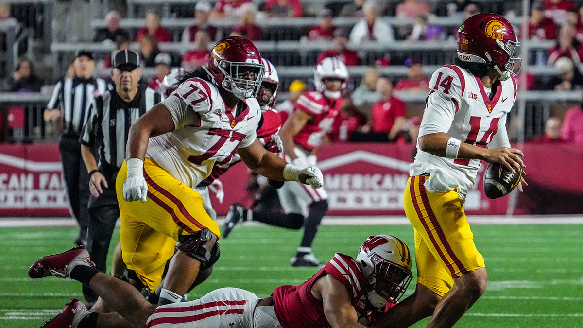 Wisconsin Badgers outside linebacker Sebastian Cheeks (15) sacks USC Trojans quarterback Jayden Maiava (14) during their game Oct. 24, 2026, at Camp Randall Stadium in Madison, Wisconsin.
